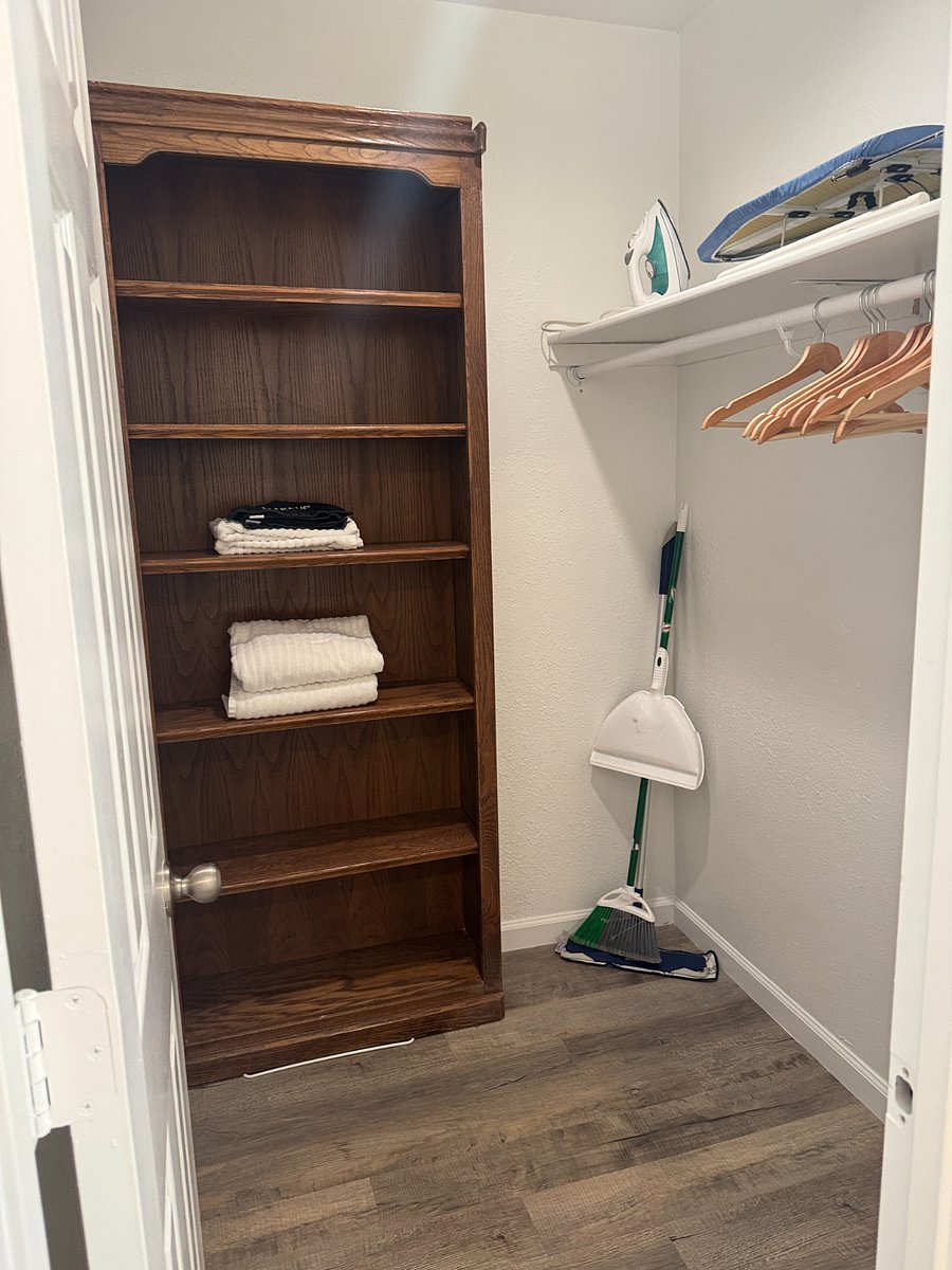 Walk in closet in primary bedroom