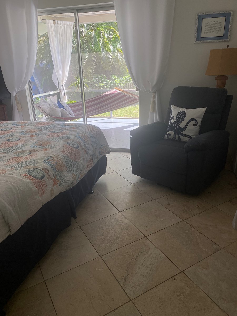 Second bedroom with queen size, bed, and TV with Amazon fire stick