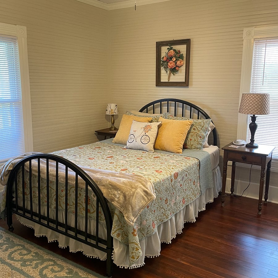 Main bedroom has a private bath and is on the first level. Note - there's also a ceiling fan in the main bedroom.