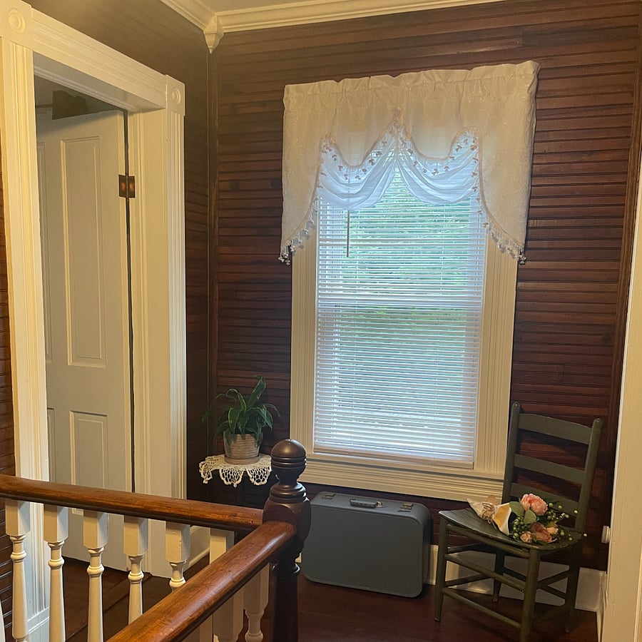 The upstairs landing is a cozy spot