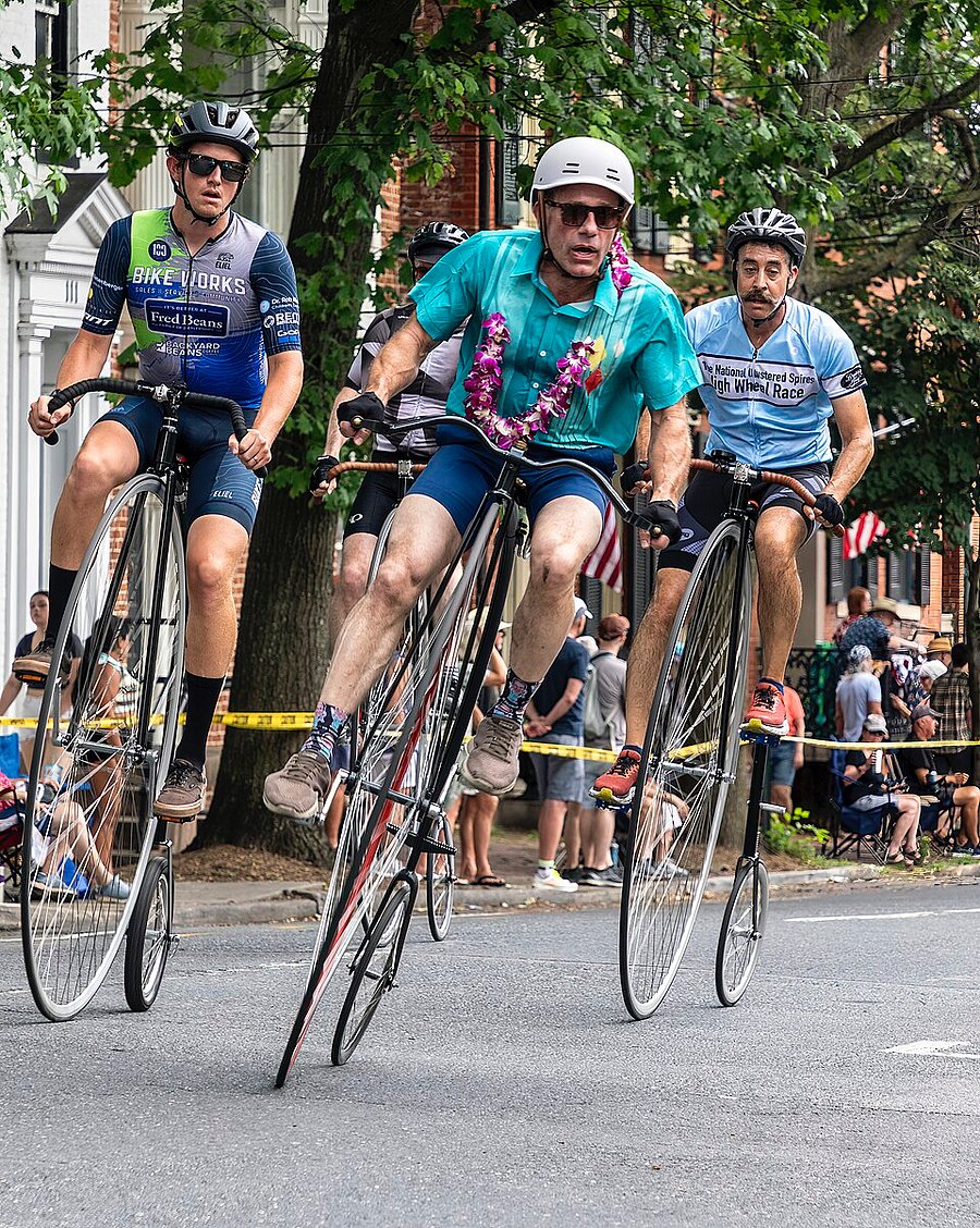 The Frederick High Wheel Race is a one-of-a-kind annual event that brings history to life as riders race through downtown on vintage bicycles.