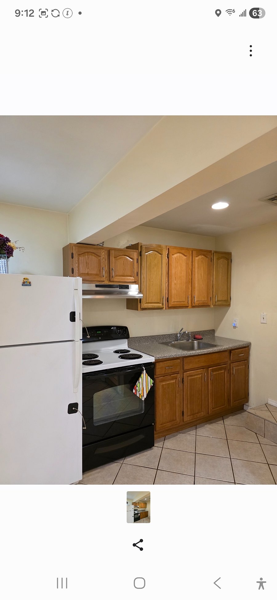 Refrigerator, Oven,cabinets in kitchen