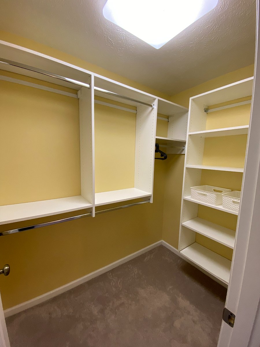 Organize with ease! The primary bedroom features two spacious closets, providing plenty of hanging rods and shelving for all your wardrobe needs.