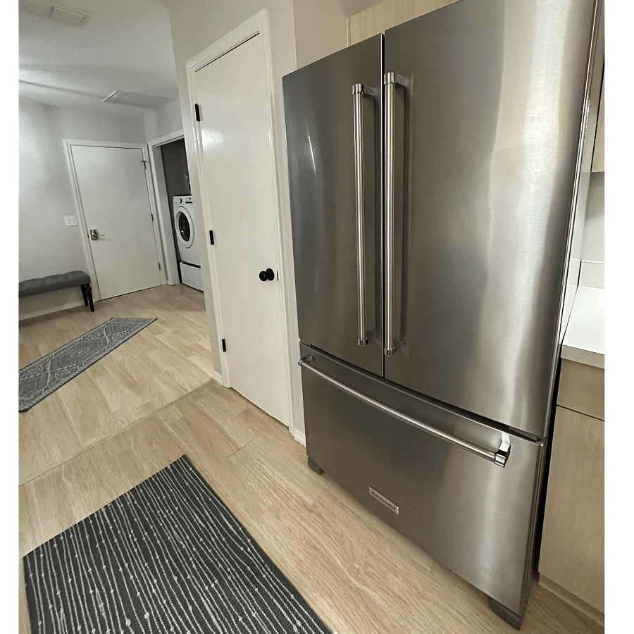KITCHEN. SS french-door large fridge with drawer freezer.