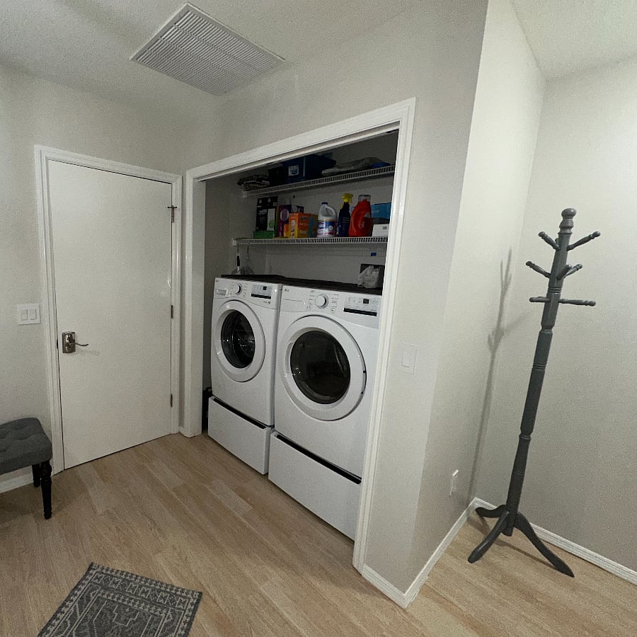 FOYER. NEW FRONT LOADER LG WASHER, DRYER ON PEDESTALS