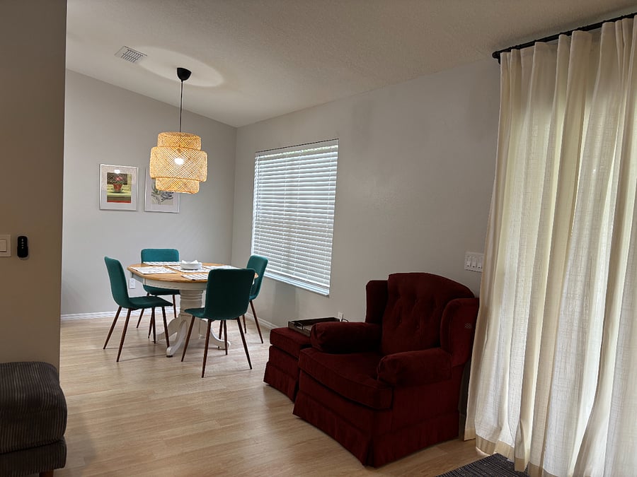 DINING ROOM, oak table seats 4. Very private, view of open fields.