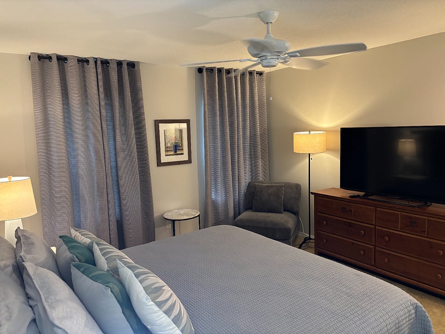 MASTER BEDROOM: New mattress, new frame, quality linens, black-out curtains, views of open fields, privacy, en-suite bathroom.