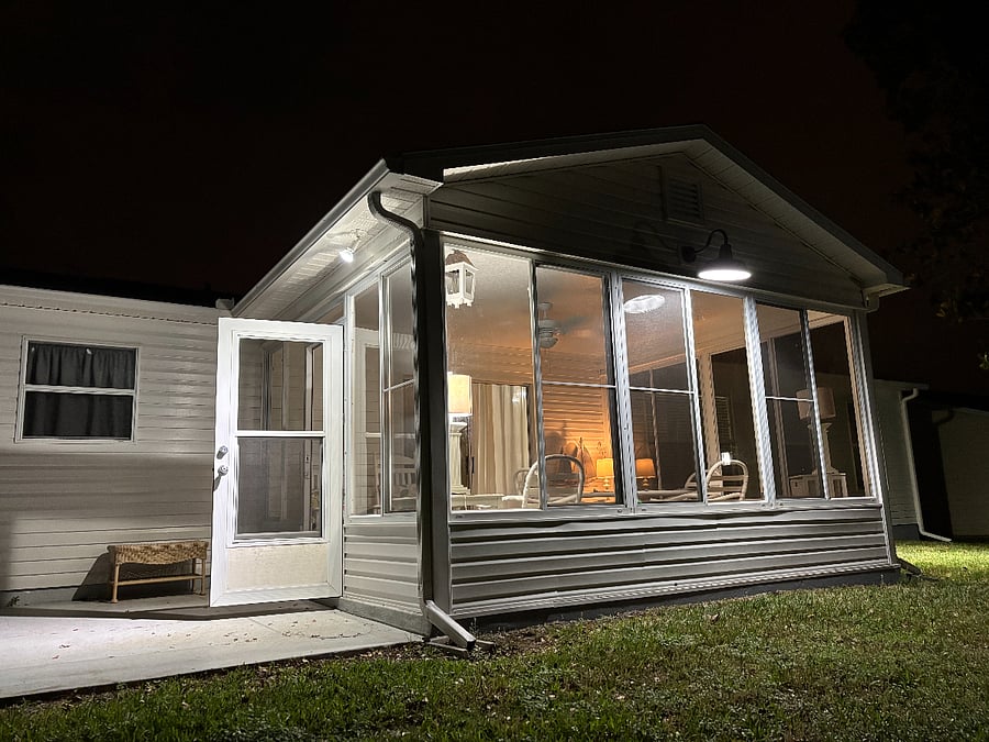 GLASSED-IN LANAI, back porch, back door.