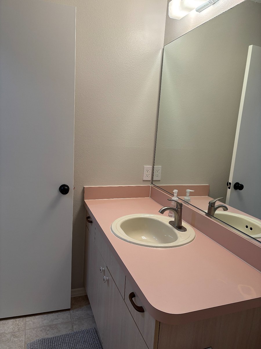 GUEST BATH: Quality linens, window for natural light.
