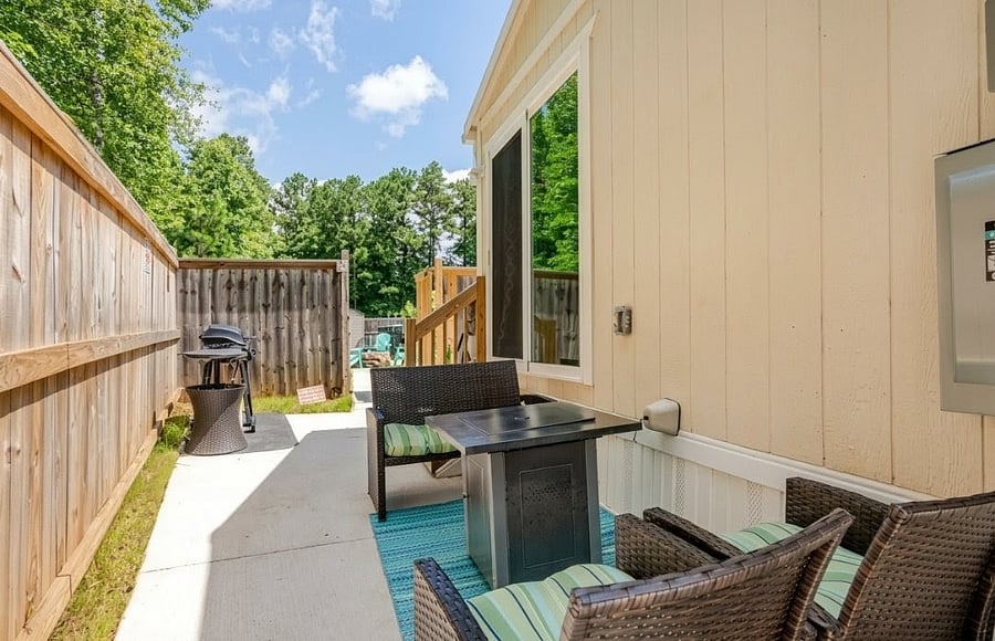 Furnished terrace with outdoor seating.