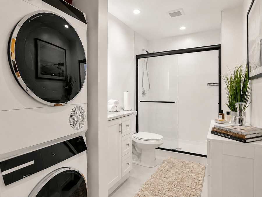 Walkin shower with inunit Bosch washer and dryer.