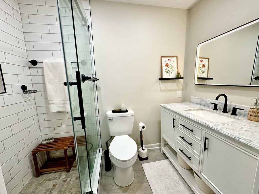 Fully remodeled master bathroom - tile shower with rain shower head and hand held 