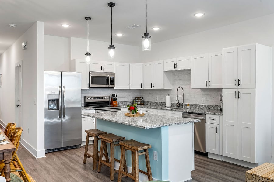 Large island for cooking, homework, a quick bite, or socializing.