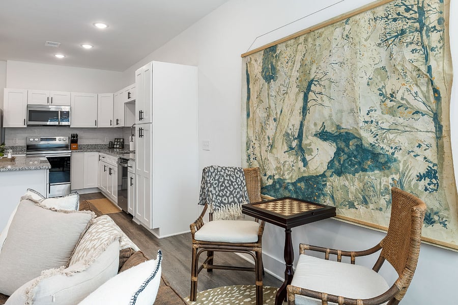 Gaming/lounge area. A versatile space for whatever you many want to do - watch TV, play chess/checkers/backgammon (it's all inside the table), pour a drink from the bar cart, or have a chat.
