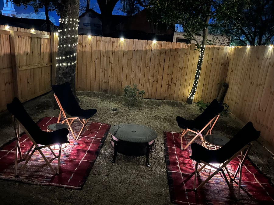 The solar lighting throughout the backyard and even the tables provide tranquil ambiance at night.