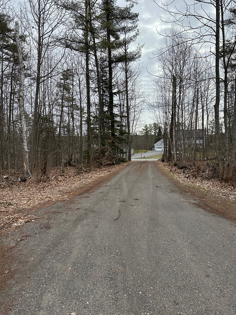 You can see the neighbor across the street from the driveway but with the woods around the house it feels very private on the property.