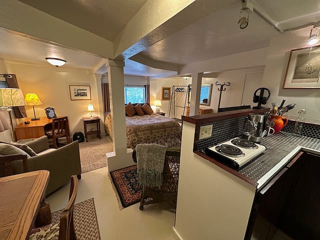 View of main room, facing north from refrigerator corner