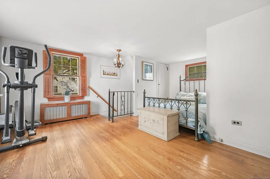 This is your guest room, with private staircase and elliptical machine.Not pictured is a chest of four drawers for your use and private TV for your use. 