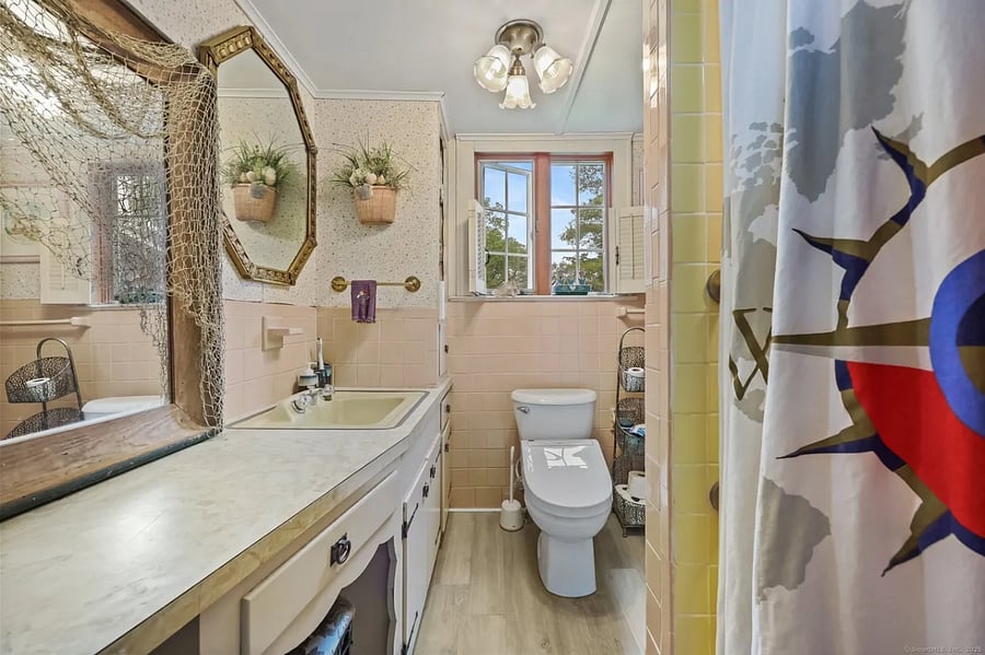 The bathroom is shared and features a Toto Washlet bidet and a heated seat. No cold toilet seats in the middle of winter nights!