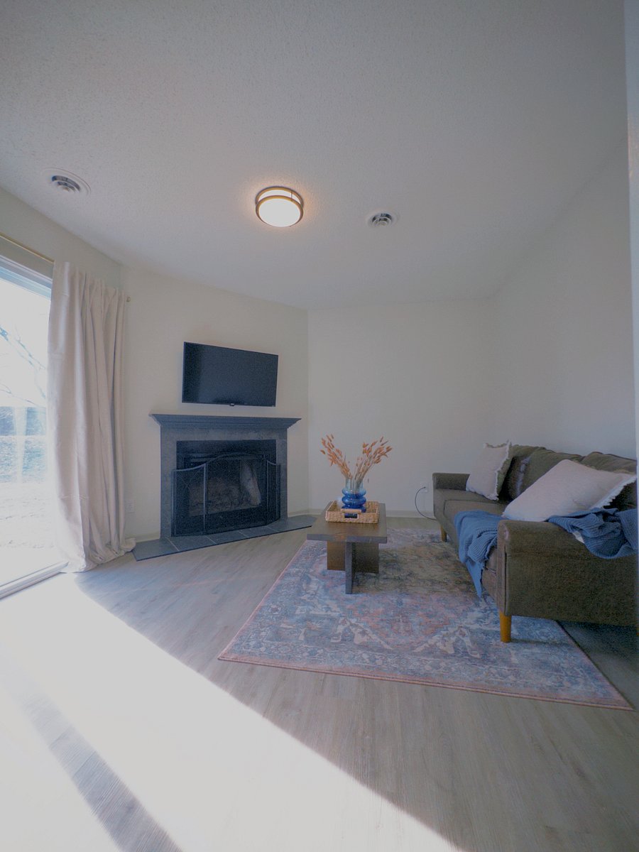 Lower level living room with walk-out patio