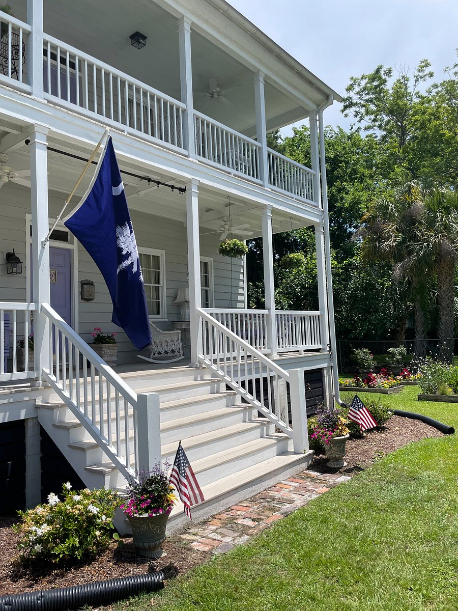 Comfy porch with fans and furniture for morning coffee, afternoon cocktails and peaceful reading