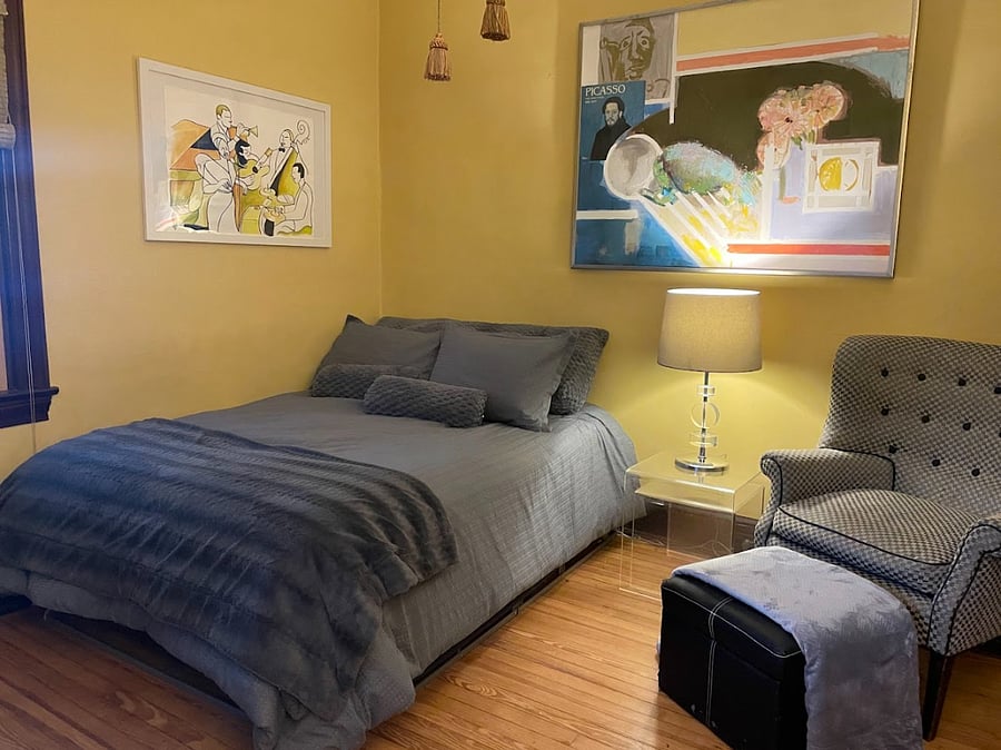 Your bedroom, 10x12. Bed, reading chair with ottoman, 56-in smart TV, TV stand w/storage, tulip table and 2 swivel chairs, 3-drawer dresser, closet.
