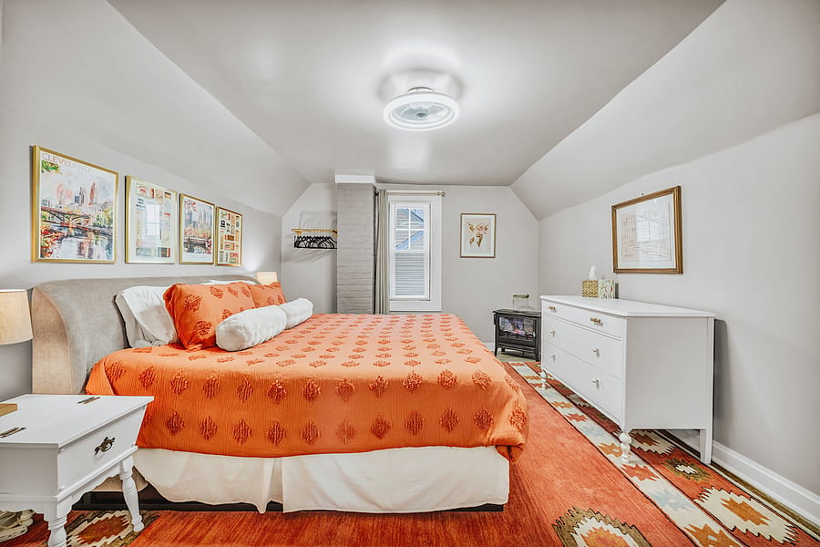The Primary Retreat . A beautifully furnished bedroom with an airy feel and thoughtful details designed for longer stays.