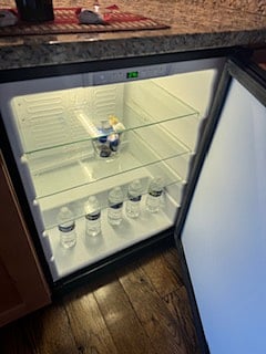 Mini fridge (access to full fridge in the garage)