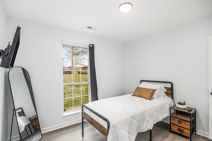 Full length mirror and TV in secondary room 