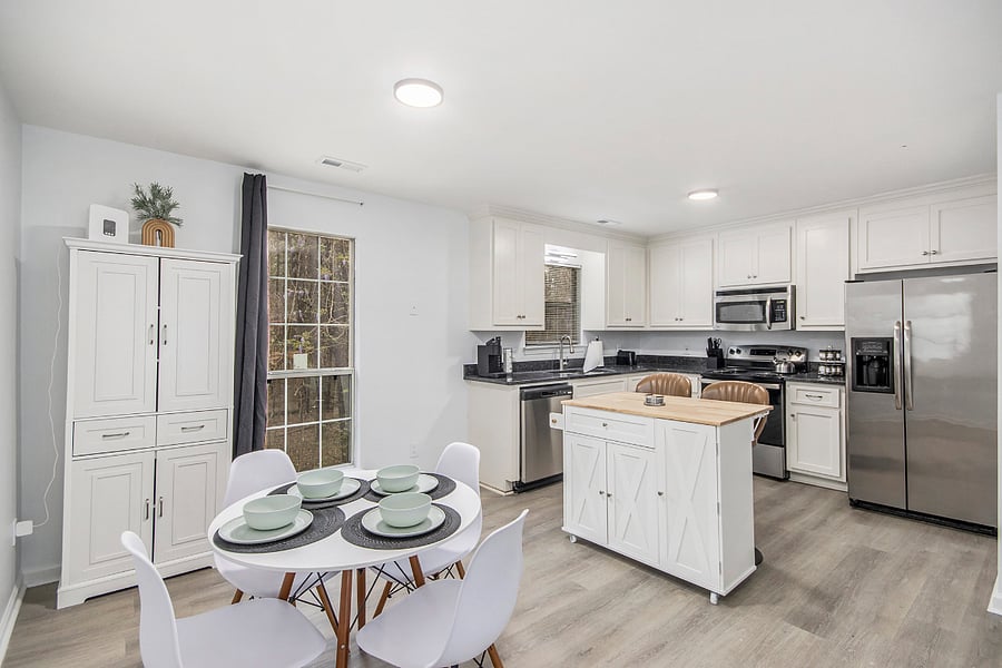 Butcher block island and 4 seater dining room table
