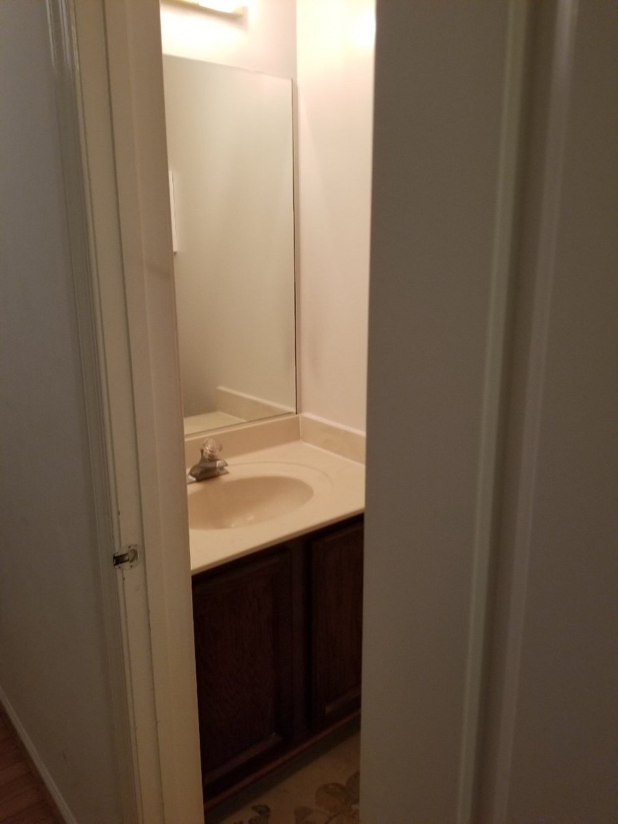 Ground Flr guest restroom (half bath); entrance view