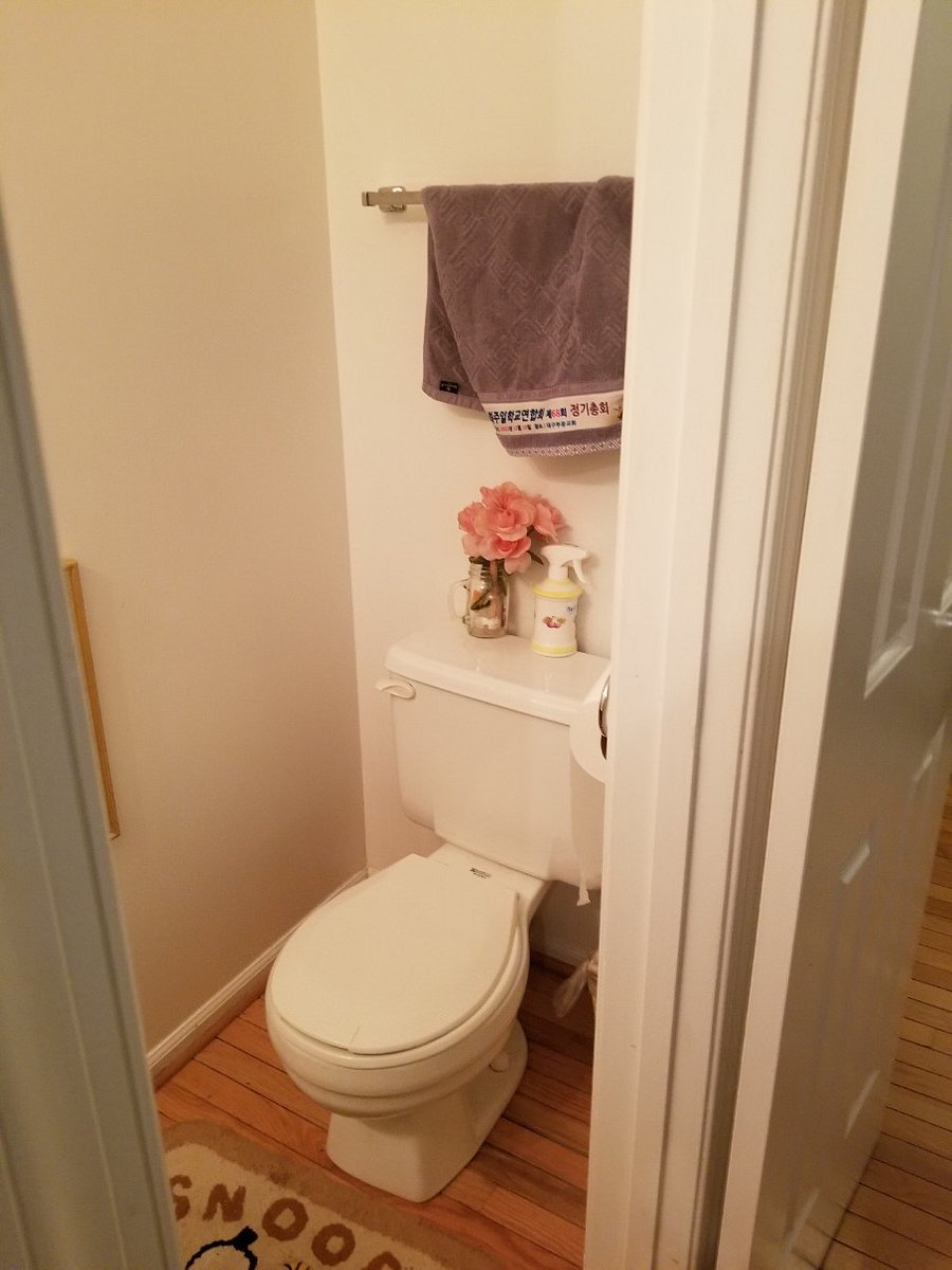 Ground Flr guest restroom (half bath); door-direction view