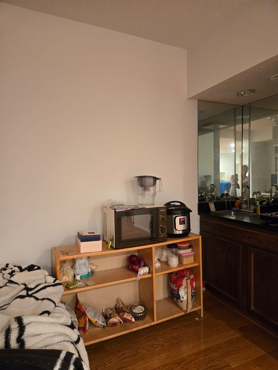 Your studio, right-turn view (90 degree); window is on left and on the right, mini-kitchen (no garbage disposal; only debris-stopper mesh/ induction/ out-Ducted hood on ceiling )