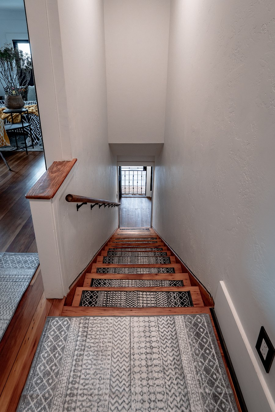 shared stairwell separates the two private studios upstairs