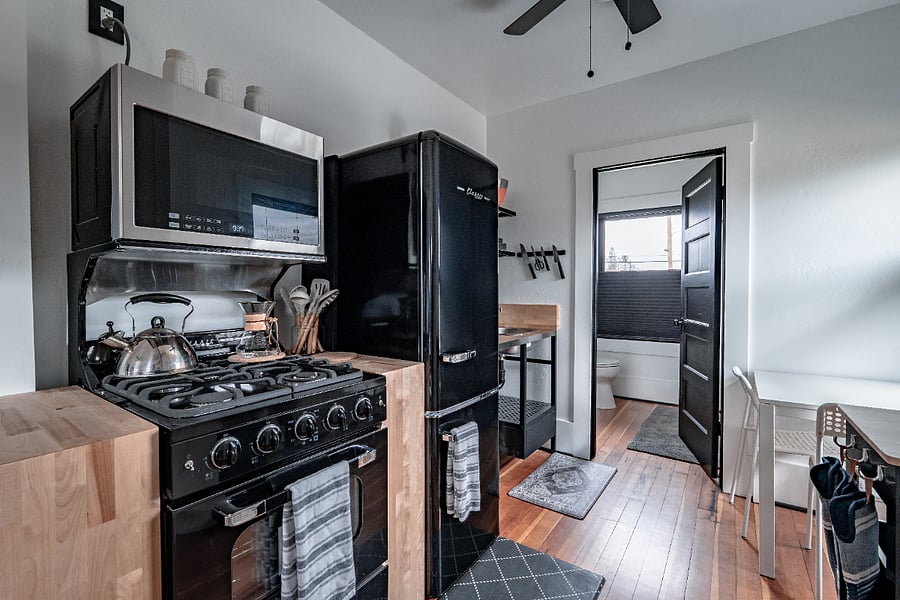 full size refrigerator, microwave & gas stove.