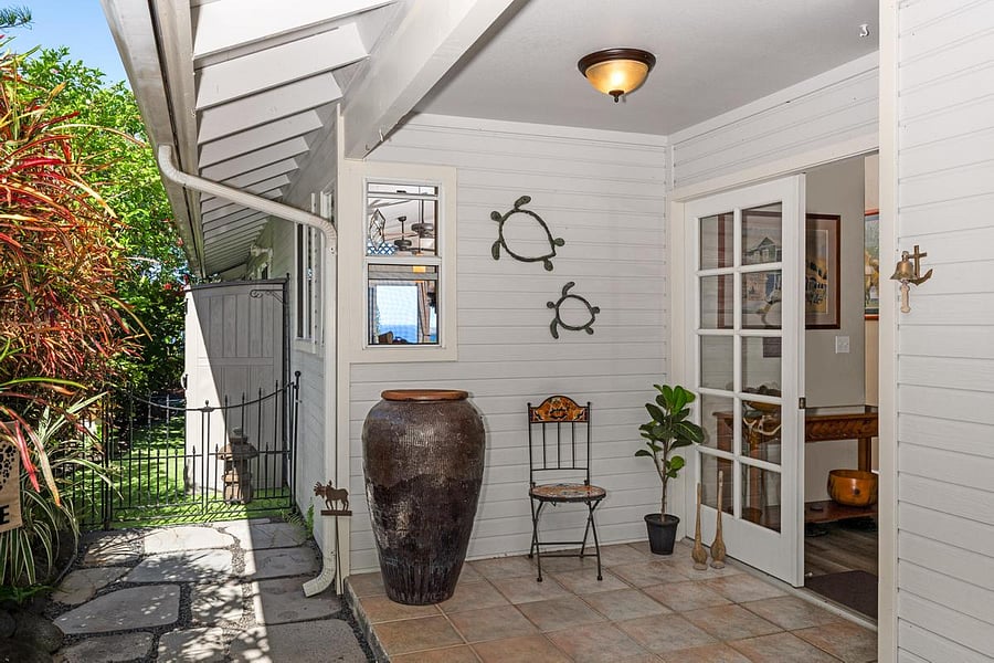 Front porch entry with french doors.
