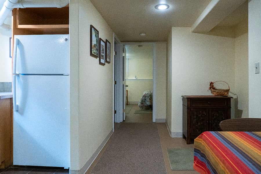 Main living space looking into bedroom.