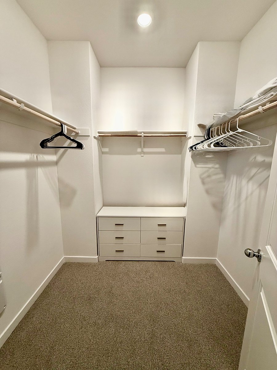 Walk-in closet for the primary room