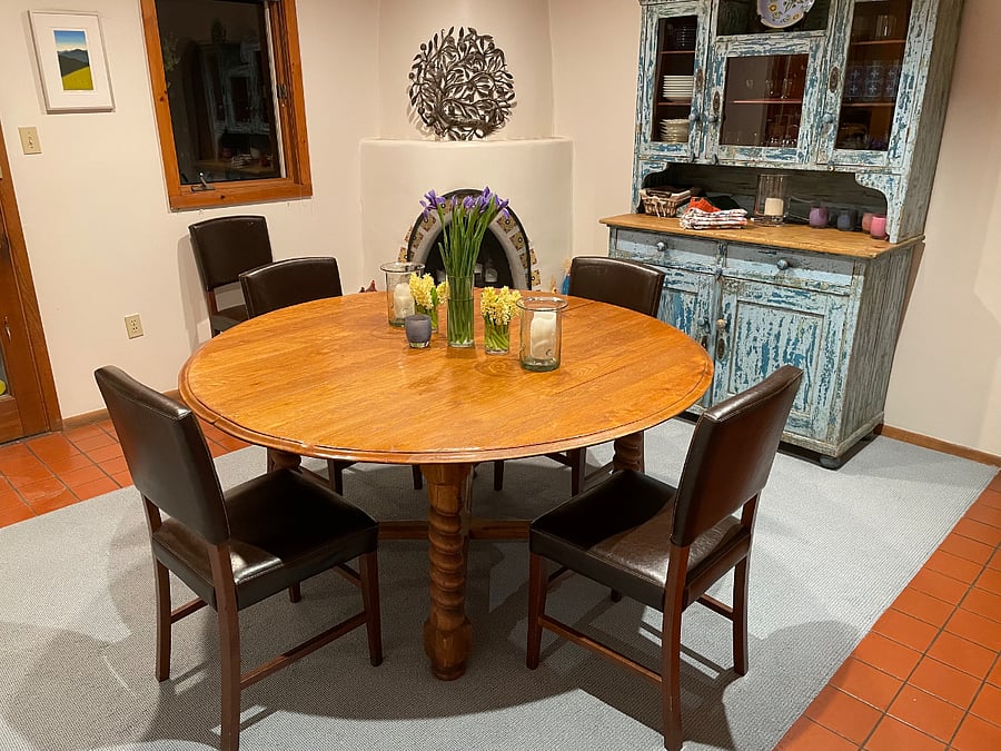 Dining area in open kitchen layout.