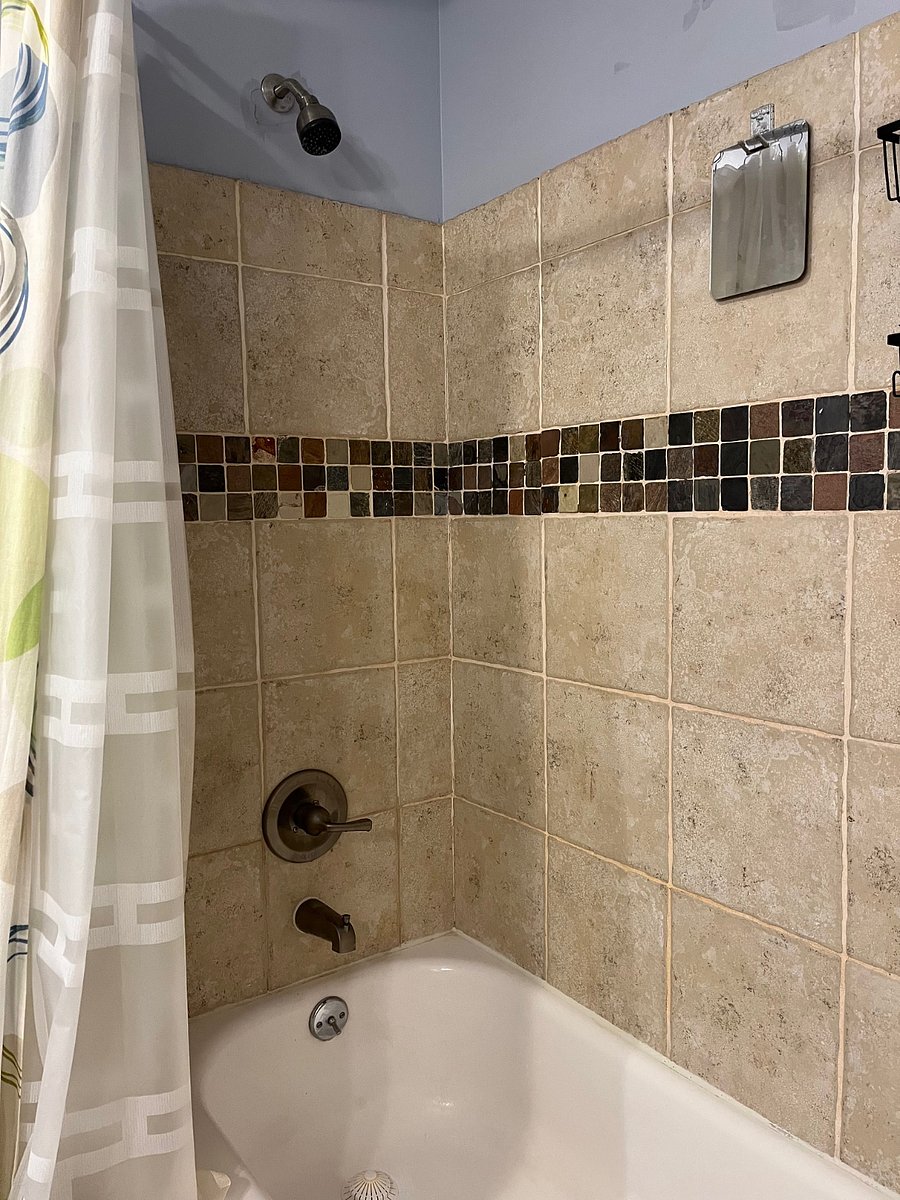 Ceramic tile with your own shower caddy for toiletries 