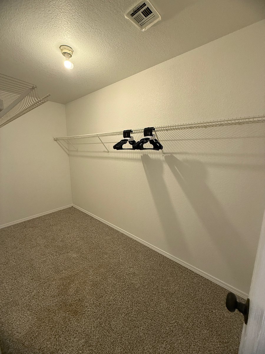 Walk-in closet off primary bedroom 