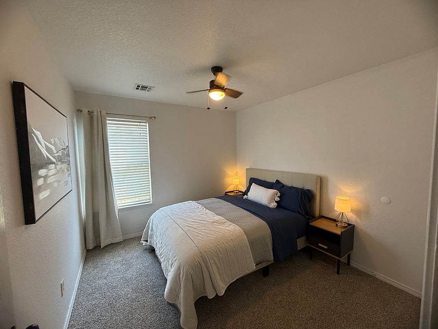 Bedroom 1 off main hall, has its own spacious closet.