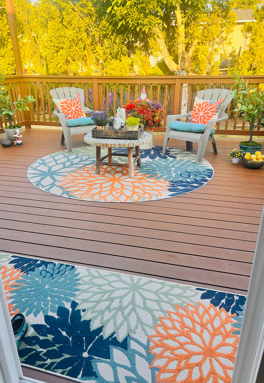 This charming porch is a perfect blend of comfort and style
