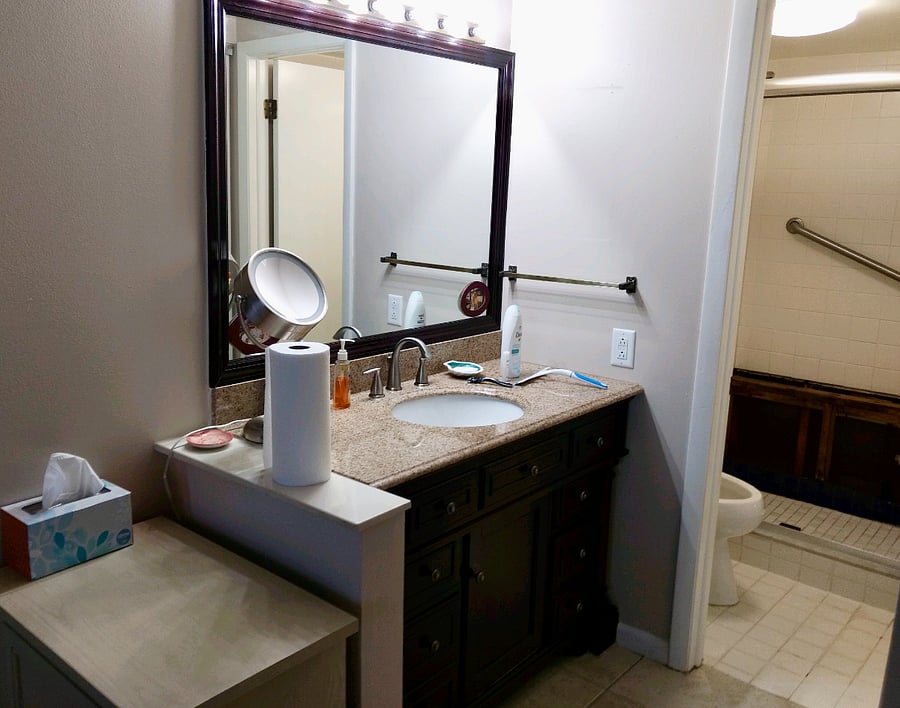 There are 2 bathrooms in this condo. One contains a shower/bath combo and the other is a shower.