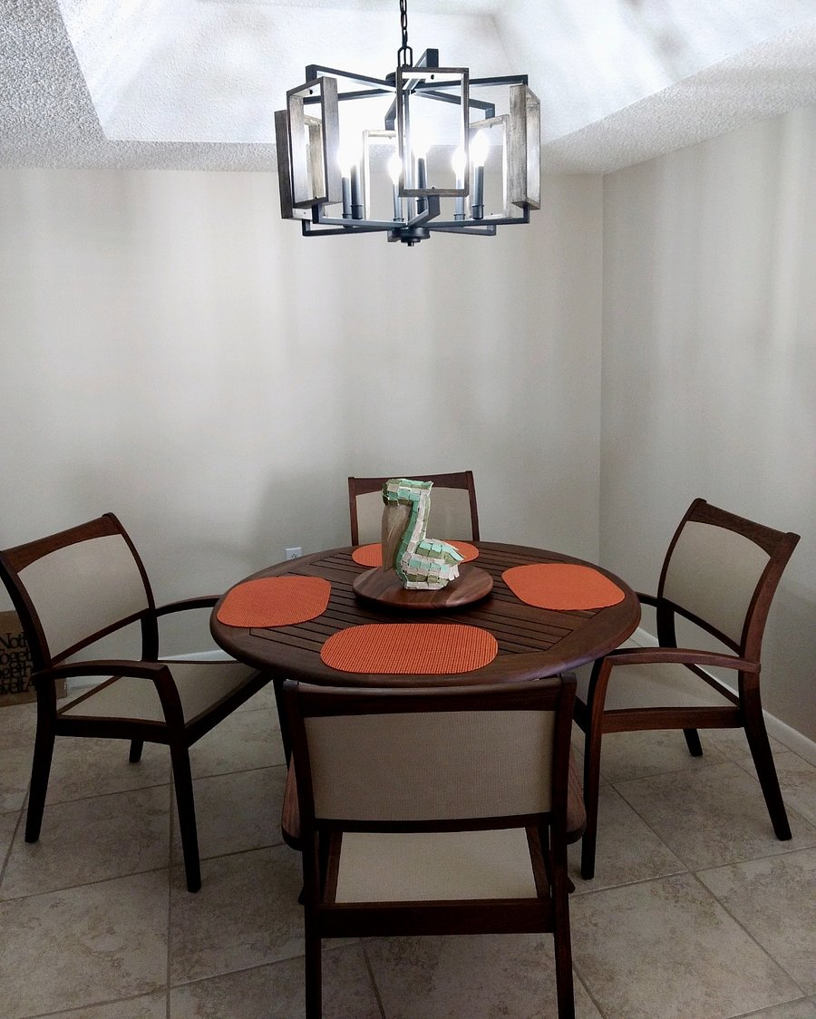 A second table is provided with seating for 4 people.