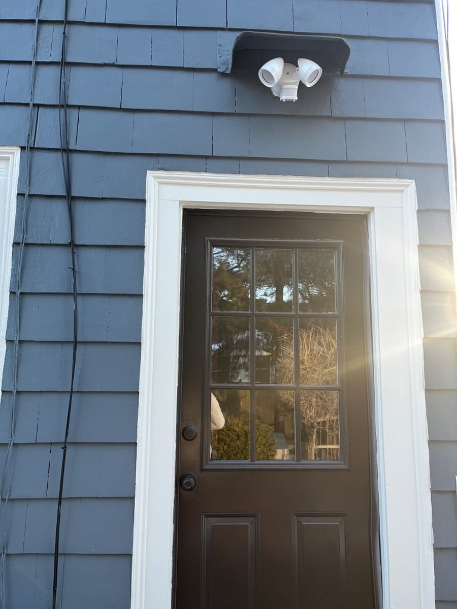 Exterior private entrance with motion light