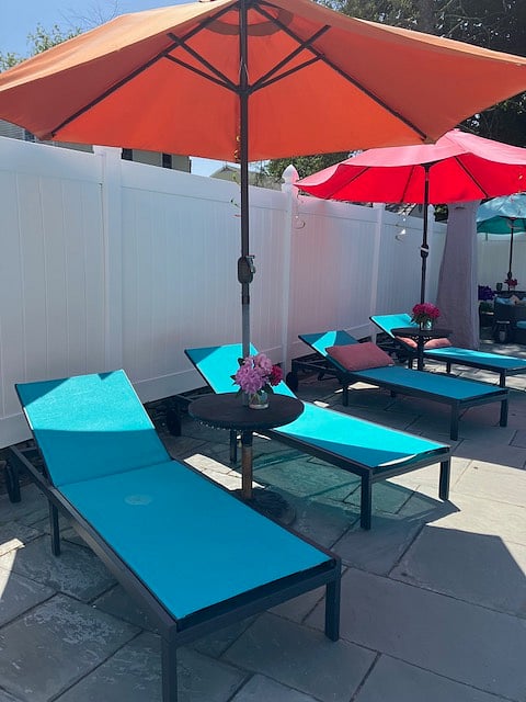 Pool area with lounge chairs