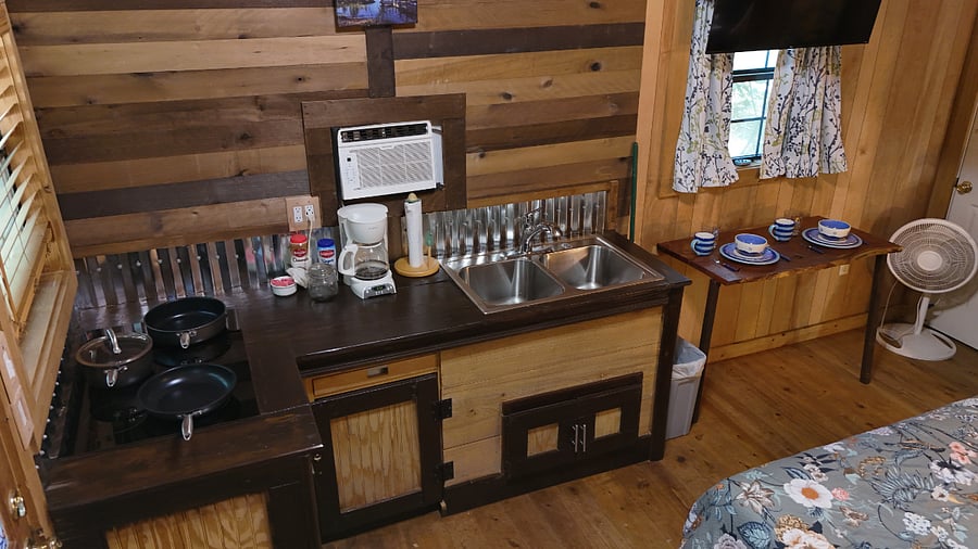 While guests have enjoyed Magnolia Cabin since its construction in 2006, the delightful kitchenette is brand new, completed in April 2025.
