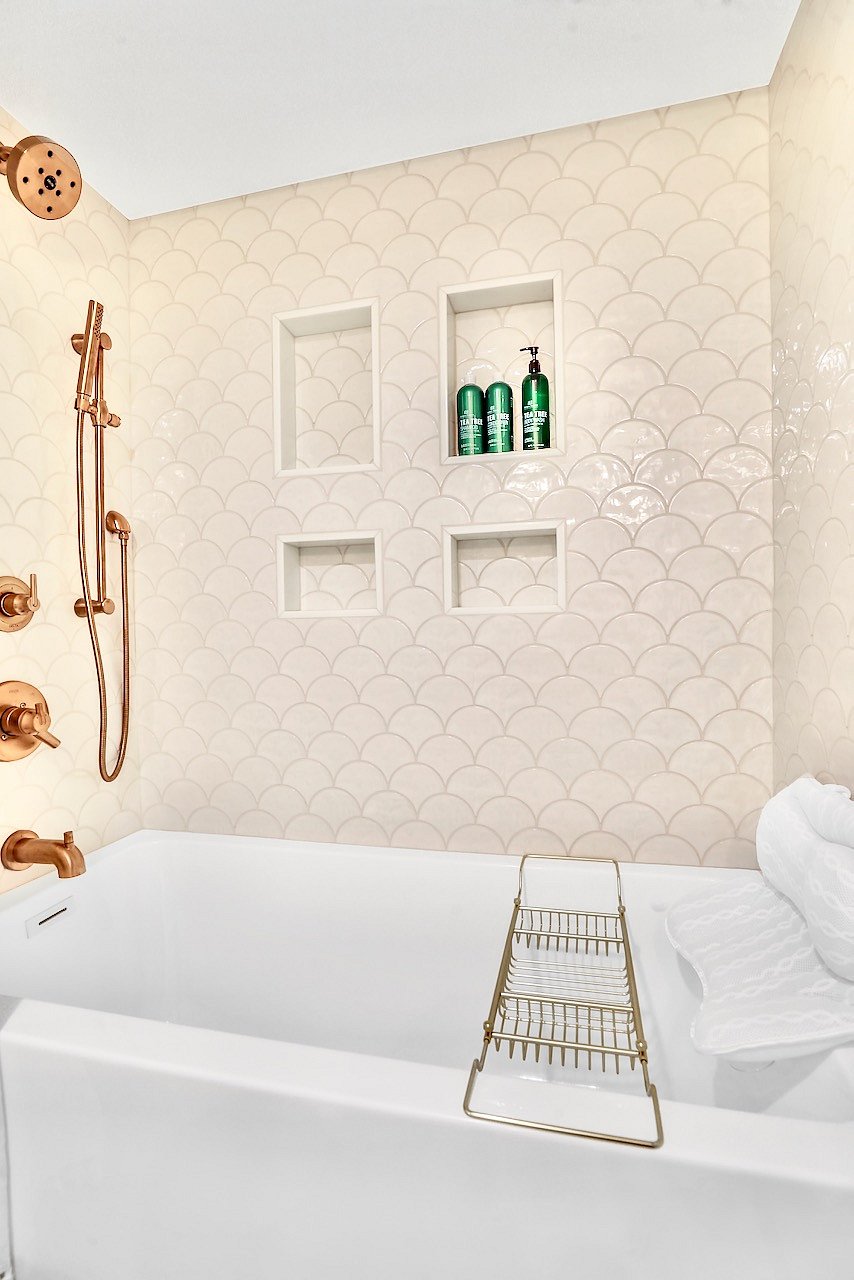 Shower head and hand-held spray.