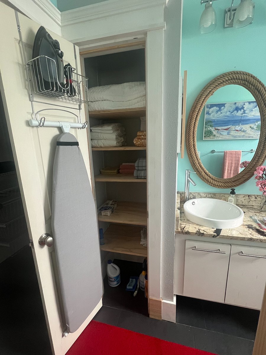 LINEN CLOSET WITH SPARE LINENS, TOWELS, ETC.